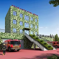Green Camouflage Fire Station Building With Red Fire Trucks Parked Firefighters And Trees