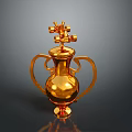 Shiny Golden Decorative Household Item With Two Handles And Ornate Top