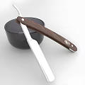 Black Bowl With Wooden Handle Straight Razor And Silver Blade On White Background