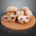 Fresh Mushrooms Whole and Sliced Displayed on a Cork Cutting Board