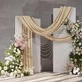 Elegant Floral Installation With Pink White Flowers Gold Drapery White Columns And Pearl Accents