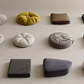 Various Floor Cushions In Different Shapes And Colors For Home Decor