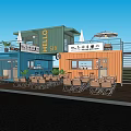 Colorful Container Building Cafe with Outdoor Seating Hello Sign and Green Trees