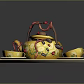 Yellow Teapot With Red Decorations And Floral Patterns On White Tray With Green Leaf Bowls