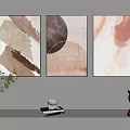 Abstract Paintings Hanging On Wall With Vase Books Cup And Stuffed Toys