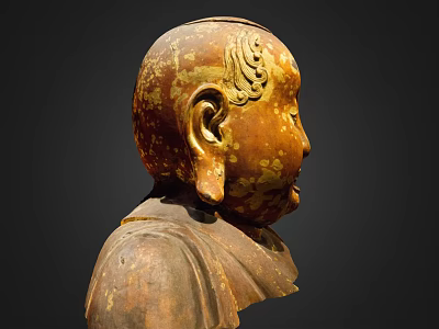 Ancient Ornate Sculpture Carving With Head Ornamental Carvings Large Ears And Aged Golden Patina 3d model