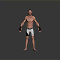 UFC Fighter Standing In Octagon With Black Gloves And White Shorts