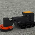 Tracked Industrial Equipment With Orange Circular Component For Ground Processing