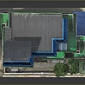 Multi Story House Model With Blue Roof Solar Panel Green Tree Balconies And White Walls