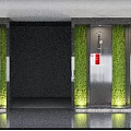 Modern Elevator Hall Interior Featuring Vertical Green Plant Wall Metal Accents Elevator Doors And Signage