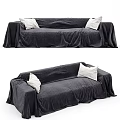 Modern Black Velvet Two Seater Sofa With White Cushions And Draped Cover