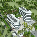 Modern Office Building Complex With Solar Panels On Roof Surrounded By Lush Trees And Greenery