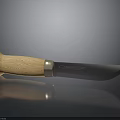 Sharp Hunting Knife With Wooden Handle And Metal Blade On Reflective Surface