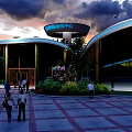 Unique Flower Shaped Building With White Petal Roof And Glass Walls Surrounded By Trees