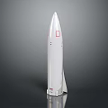 White Rocket Model with Red Accents and Sleek Aerodynamic Design Displayed on Reflective Surface 3d model