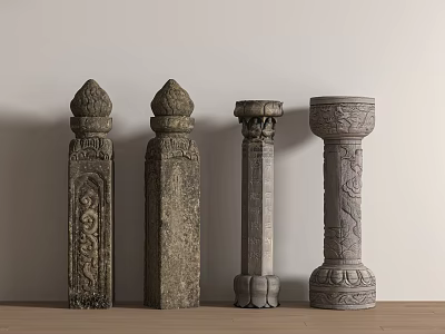 Various Styles Of Decorative Stone Pillars With Carved Patterns On Wooden Surface Against Light Background 3d model
