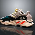 Stylish Modern Sneakers With Gray Upper Orange Accents Yellow Laces And Thick Wavy Sole Design