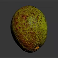 Fresh Ripe Avocado With Green Brown Speckled Skin On Dark Surface