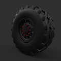 Heavy Duty Off Road Tire With Aggressive Tread Pattern And Red Rim Details