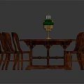 Oval Wooden Dining Table With Eight Wooden Chairs And Green Candlesticks