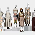 Multiple Fashion Models Showcasing Various Stylish Outfits On Display Stands 3d model
