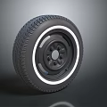 Car Tire with Tread Pattern and White Accent Rim Black Hub Design