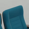 Modern Blue Seats With Wooden Armrests Arranged In Multiple Cinema Rows