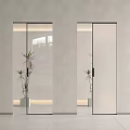 Sleek Modern Interior Sliding Glass Doors With Natural Light And Potted Plants