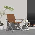 Brown Leather Leisure Chair with Metal Frame Green Plant and Fireplace in Indoor Space