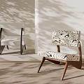 Modern Leisure Chair Featuring Swirl Pattern Upholstery And Wooden Legs With Shadow Effects