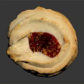 Golden Round Buttery Cookie With Red Jam Filling On Dark Background