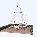 Teepee Style Outdoor Tent Setup On Wooden Deck With Hedges And Seating