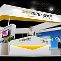 Modern Smilalign Exhibition Booth With Reception Desk Green Plants And Large Screen