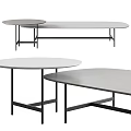 Modern Coffee Tables With Round And Oval Shapes Light Colored Tops And Black Metal Legs