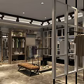 Modern Clothing Store Interior With Clothing Racks Displayed Garments And Seating Area
