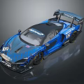 Blue McLaren Racing Car With Renault Logo Aerodynamic Rear Wing And Number 12