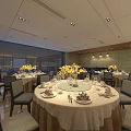 Elegant Restaurant Interior With Round Tables White Tablecloths And Yellow Flower Centerpieces