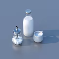 Fresh Milk Bottle With Glass Jar And Small Milk Cup On Blue Background