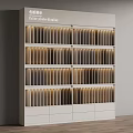 Color Plate Display White Cabinet With Illuminated Shelves And Various Colored Plates