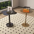 Black and Wooden Side Tables with Spiral Base Round Top and Books on Patterned Rug