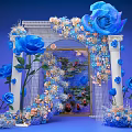 Event Entrance Archway With Blue Roses Pink Floral Decorations Water Lily Painting And White Columns