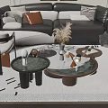 Modern Sofa Coffee Table Set with White Upholstery Gray Brown Pillows Round Marble Top Wall Art