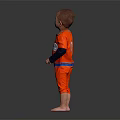 Man In Orange Jumpsuit With Blue Belt And Logo Standing Barefoot On Black Background