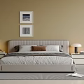 Double Bed with Beige Bedhead Pillows Nightstands Table Lamps and Wall Paintings on Striped Rug