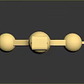 Golden Decorative Key With Cross Shaped Top Spherical Ornaments And Reflective Metallic Finish