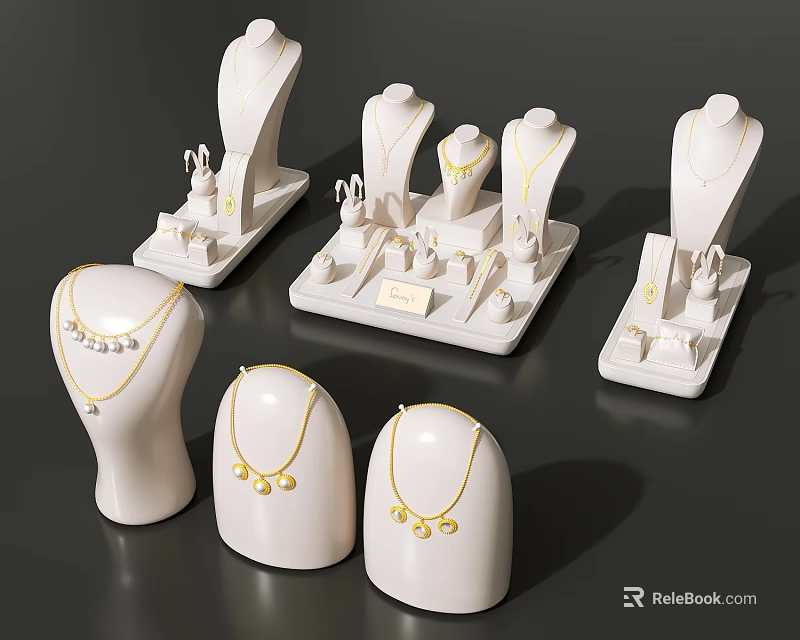 Elegant Jewelry Display with White Mannequins Necklaces and Earrings on Stands 3d model 