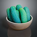 Fresh green cucumbers placed in a wooden bowl on dark surface