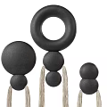 Modern Black Round Wall Decor With Stacked Spheres And Hanging Tassels Design