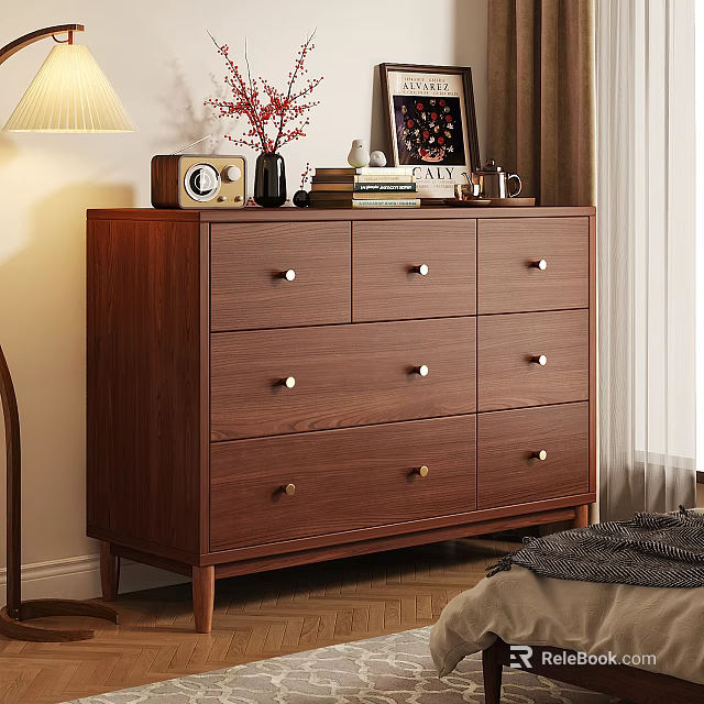 Wooden Dresser with Metal Handles Topped with Table Lamp Vase Photo Frame Radio and Books 3d model 