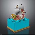 Colorful Toy Ship Model With Decorative Sail And Blue Wave Base